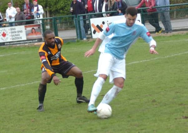 Taser Hassan on the ball for Hastings United in last weekend's win over Three Bridges. Picture by Simon Newstead