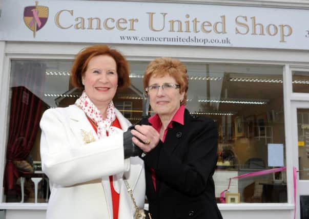 Cancer Uniteds director Jan Sheward, right, pictured with Frances Grundon, at the opening of the former Wick store, last year   L10028H13