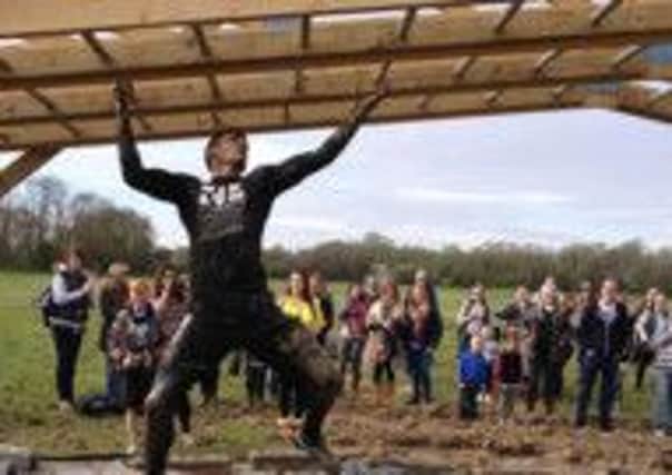RP Combat Conditioning member Zak Horsley tackles the monkey bars at the Dirty Dozen event in Paddock Wood last weekend