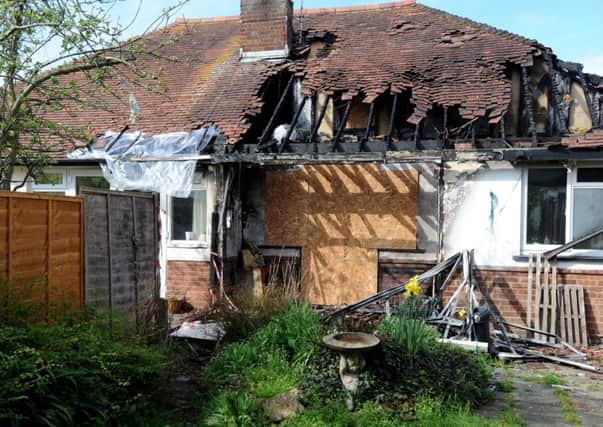 Mathew Hodgton's bungalow in Burgess Hill was severly damaged by fire. Steve Robards SUS-141004-163631001