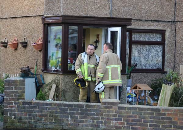 Firefighters at a house fire in Ruskin Road           Photo by Eddie Mitchell