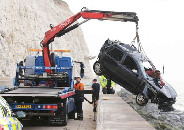A motorist from Worthing had a lucky escape when his car plunged 100ft from a cliff    PHOTOS: Eddie Mitchell