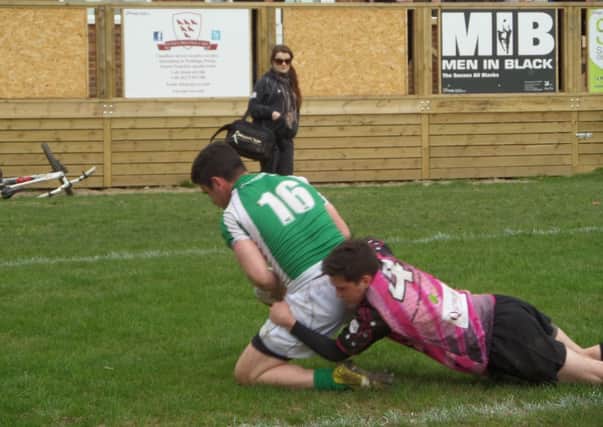 Ben Rush scores for Horsham on Saturday while (below) Jamnie Gibbs scored two tries. Picture by Amanda Kelland