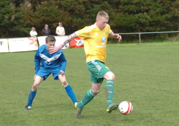 Steve Thomson on the ball for Westfield during their comeback victory over Storrington. Picture by Simon Newstead