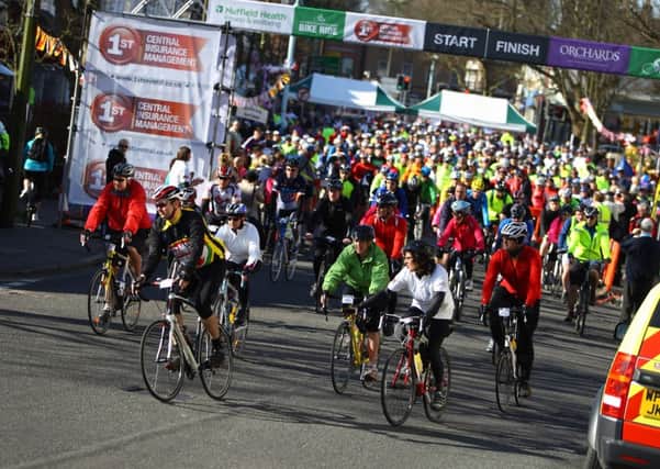 Competitors pass the start line during the Greater Haywards Heath Bike Ride on April 21, 2013.