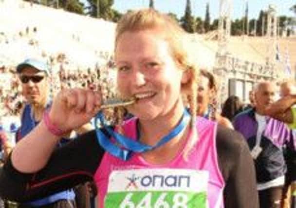 Natalie Chivers at the finish of the Athens Marathon last year