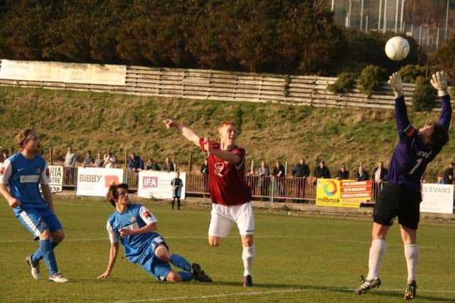 Trevor McCreadie scores one of his three goals in Hastings United's 4-0 win at home to Worthing at the end of last month. Picture by Terry S. Blackman
