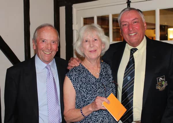 Donald and Rosemary Parvin receiving their prize from this years Club Captain, Derek May