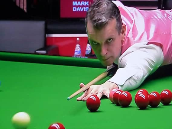 Mark Davis is 7-2 down against Dominic Dale after the opening session at The Crucible Theatre in Sheffield