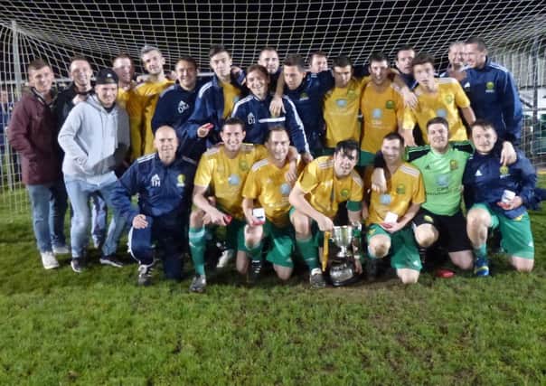 Westfield Football Club celebrates winning the Hastings & District FA Senior Cup