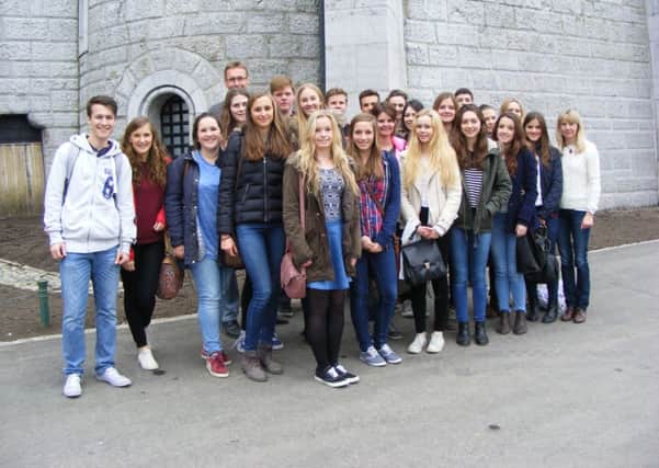 English and German students with their teachers at the Neuschwanstein castle SUS-140425-130242001