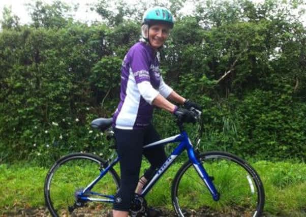 Carol Franklin-Adams, who is cycling to Land's End for Alzheimer's Research UK in memory of her husband Patrick