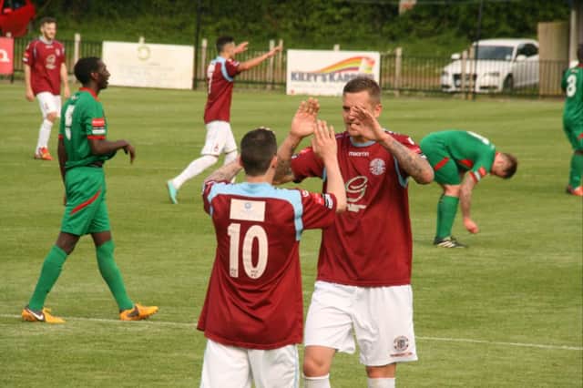 Hastings United strikers Kenny Pogue and Frankie Sawyer (10) celebrate against Crawley Down Gatwick on Saturday. Picture by Terry S. Blackman