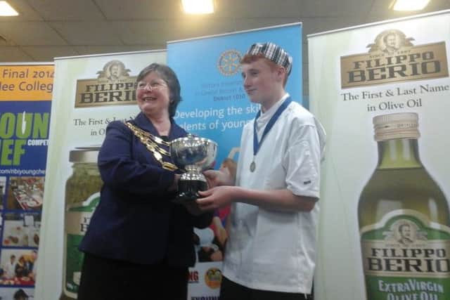 Rotary Young Chef contest winner Tom Hamblet with Rotary UK President Nan McCreadie - picture submitted