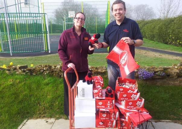 Ingfield Manor multi-use games area receives donation of sports eqipment from Sainsbury's - submitted