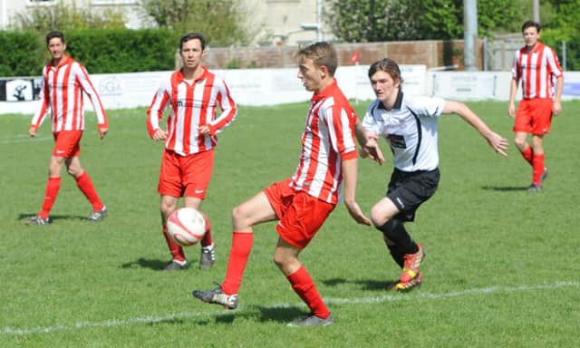 Action from Bexhill United's 3-1 win away to Steyning Town on the final day of the club's league season. Picture by Derek Martin