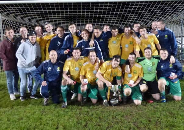 Westfield Football Club celebrates winning the Hastings & District FA Senior Cup in what turned out to be the penultimate game under the management of Tony Harris, Duncan Jones and Mat Ball