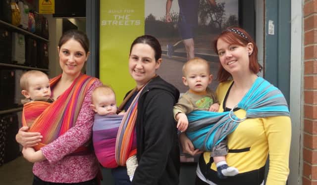 Protest over breast feeding awareness at Sports Direct, Worthing SUS-140205-142821001
