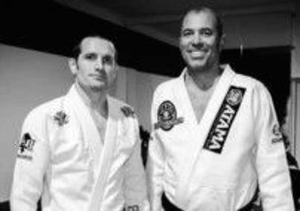 Paul Bridges and martial arts legend Royce Gracie