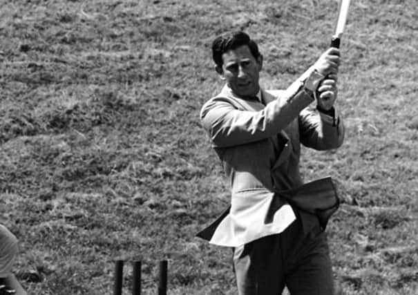 Prince Charles gives the jubilant press a good photo opportunity at Arundel castle cricket ground, c1980