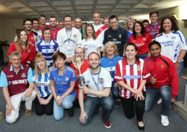 Southern Water staff wore football shirts to work to raise money for the Bobby Moore Fund