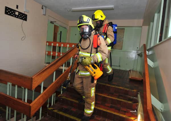 6/5/14- Battle and  Lewes firefighters undergoing a 'building collapse' training event with the technical rescue units. Firefighters asked not to be named. SUS-140605-131615001