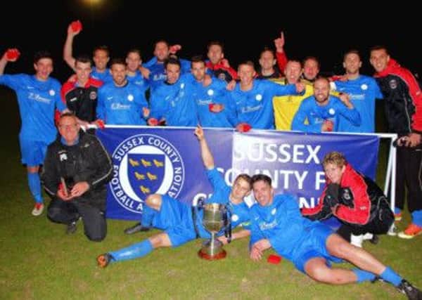 Horsham YMCA celebrate winning the Sussex RUR Cup. Picture by Terry Buckman