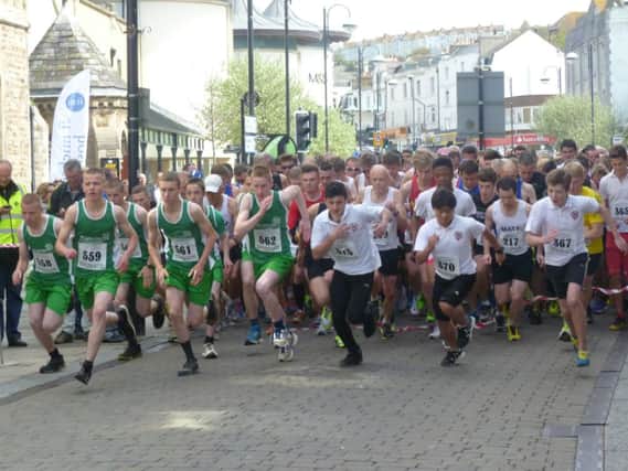Competitors set off in the 2013 staging of the Hastings Runners Five-Mile Race