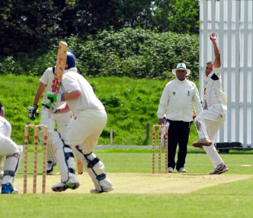 Imran Javed bowling for Hastings Priory in their draw at home to Brighton & Hove. Picture by Steve Hunnisett (fh19012b)
