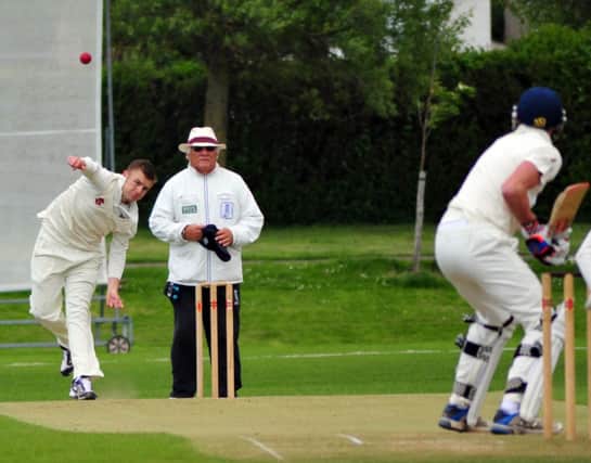 Jamie Bristow-Diamond bowls for Bexhill during their victory at home to Eastbourne. Picture by Steve Hunnisett (fh19014a)
