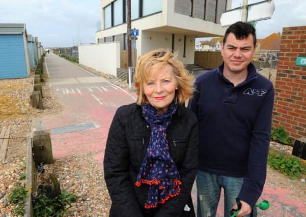 WH 090514 Lancing residents Valerie Suttle and Clive Gabriel on the seafront path where speeding cyclists are a danger to pedestrians.