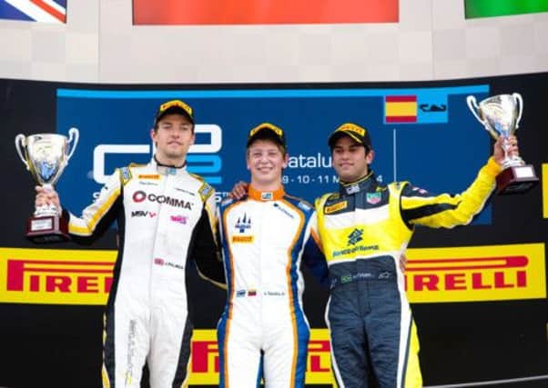Jolyon Palmer (left) has been on the podium in all four races of the season so far