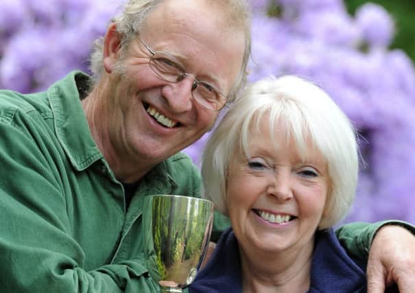 JPCT 090514 S14200346x Storrington. Rhododendrons. Andy and Jenny Fly,  with awards -photo by Steve Cobb SUS-140905-124808001