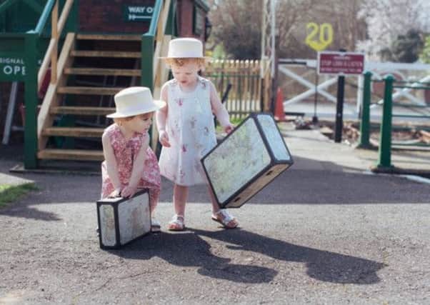 Lorelei Winterfrost and Sunnie Owen, both two, take part in a photoshoot for Molly Coddle childrenswear at Lavender Line Railway in Uckfield - picture submitted
