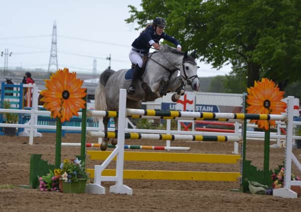 Horsham Showjumper Alice Palmer, 20, takes both qualifying spots in the EquestrianClearance.com Senior Newcomers Second Rounds