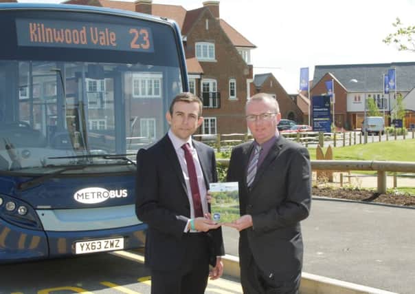Nick Hill from Metrobus and James King from Crest Nicholson mark the launch of the number 23 Horsham to Crawley bus service calling at Kilnwood Vale, Crawley - picture submitted