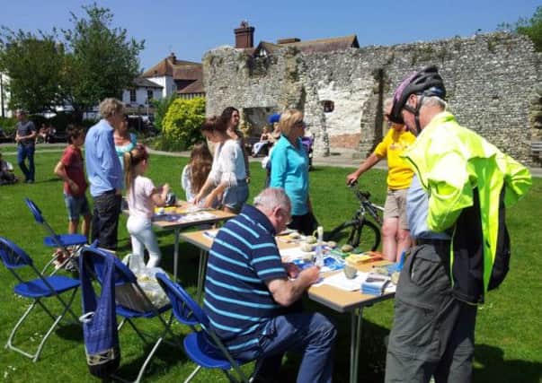 Cyclists look at plans in Jubilee Gardens to improve Arundel's cycle routes