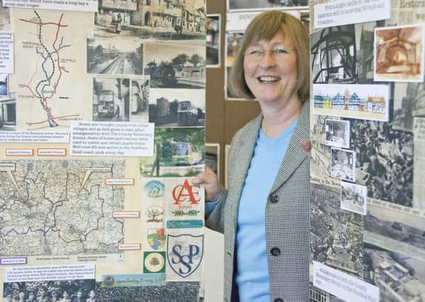 Former art teacher Caroline Meeson in Chatfields with the grammar school exhibition she helped to create