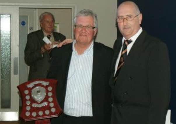 Alan Ladd receives the Bobby Nash Award from chairman Paul Terry SUS-140605-141348002