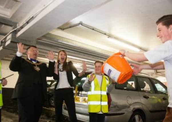 Volunteers washed cars for charity in Worthing car park