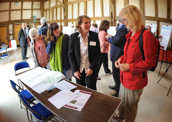 JPCT 210514 S14210823x Horsham. Linden Homes exhibition of proposed development north of Parsonage Road at Holbrook Tythe Barn -photo by Steve Cobb SUS-140521-170725001