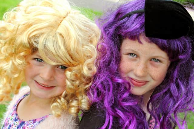 Five-year-old Lyra Toulouse, left, and Amber Steer, nine