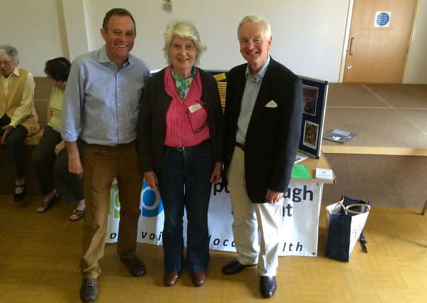 Nick Herbert MP with Jean Seagrim MBE and Councillor Roger Paterson (Pulbororough) in front of the Pulborough & District Community Care Association stand at Pulborough Expo. SUS-140523-160628001