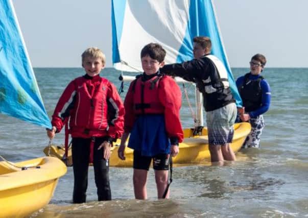 Youngsters enjoy the action at Felpham SC's Push the Boat Out day  Picture by Tony Lord