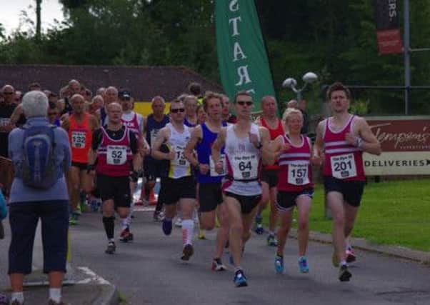Bryan Camfield of Horsham Joggers leading the pack at the start of Sundays Rye 10 Mile Race