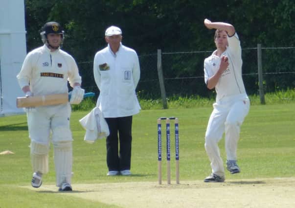 Ed Smissen bowling for Crowhurst Park against Rottingdean on Sunday. Picture by Simon Newstead (SUS-140526-111105002)
