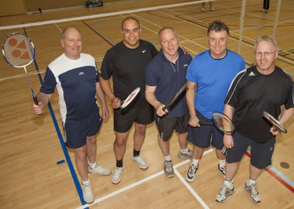 Five of the group of 12 badminton players who are raising money for the British Heart Foundation