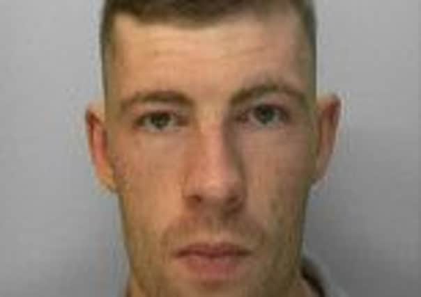 Police are offering £1,000 for information which leads to the arrest of Sean Tierney
