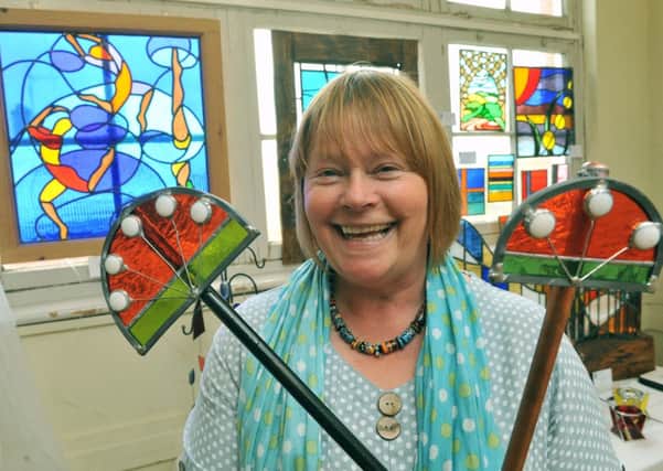S22752H14 Lorna Casey with her stained glass at at the Centerpiece exhibition in St Mary's Hall