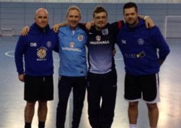 Hastings Futsal coaches Danny Barrellie (left) and Graham Knight (right) with two England Futsal coaches at St George's Park